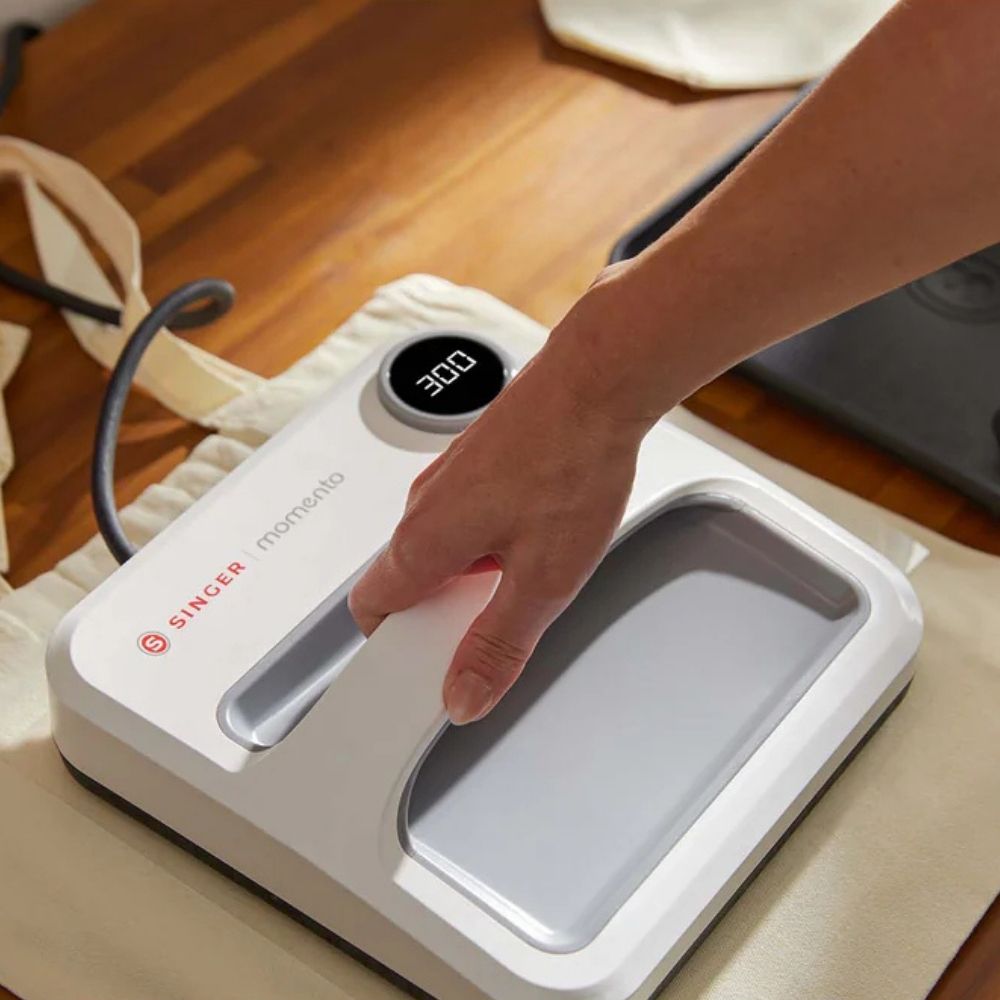 Singer Momento Square Transferpresse